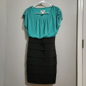 Mint top black ruffled bottom dress